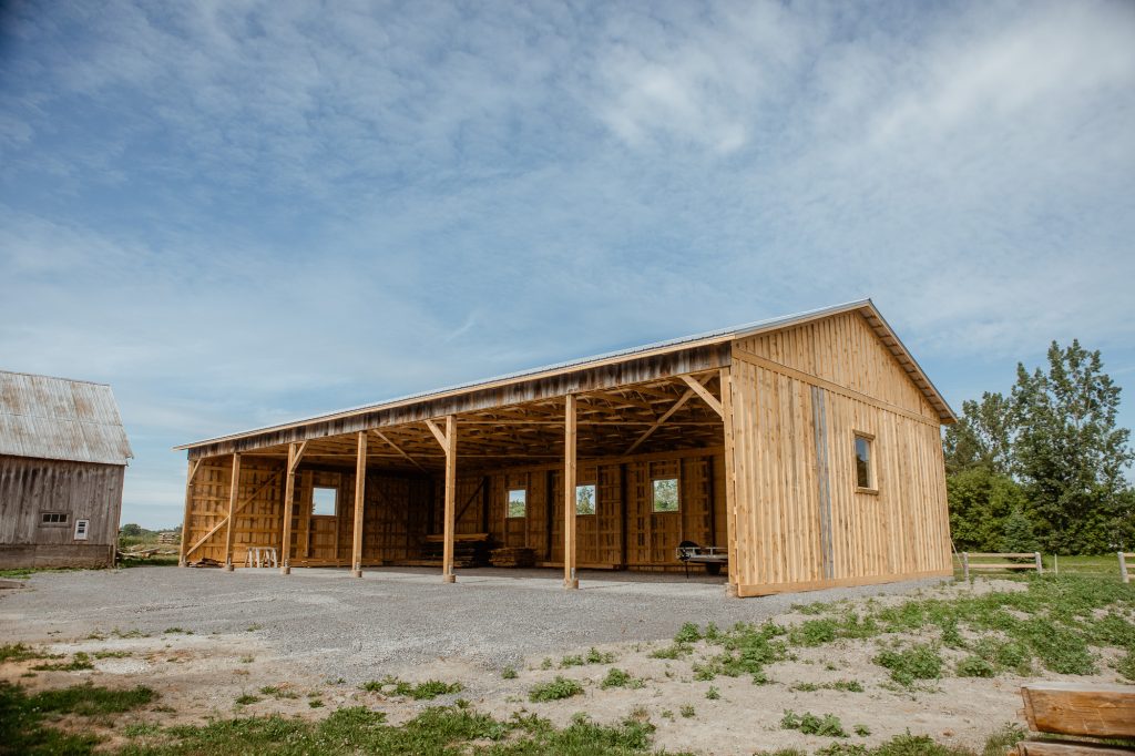 The finished barn in Carp Ontario featuring steel roofing and board and batten siding