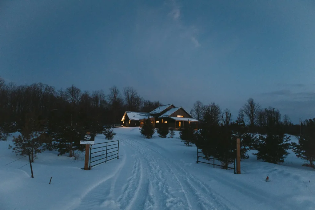 Custom built home with Baird Carpentry sign in the foreground